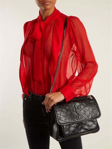 niki quilted leather zip pouch ysl|YSL saint laurent niki.